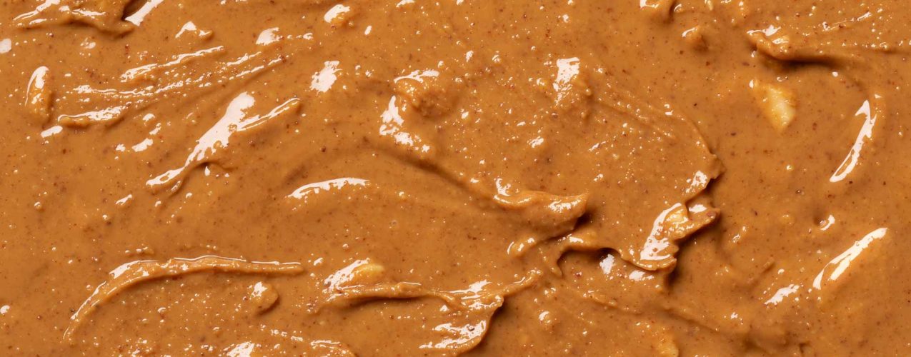 coarsely-ground-peanut-butter-full-frame-as-backgr-2024-09-18-02-24-45-utc