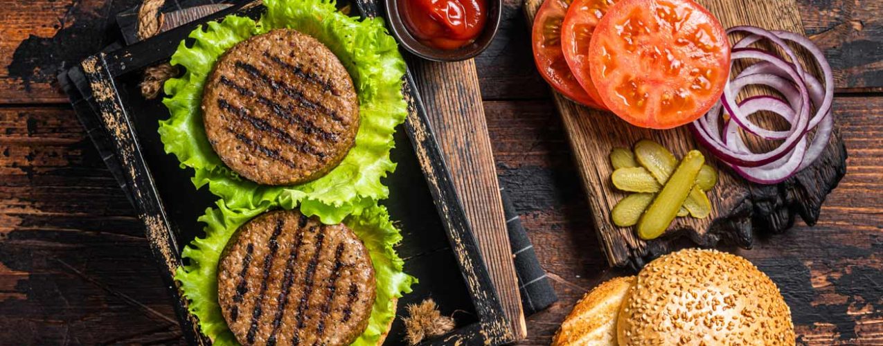 cooking-plant-based-meatless-burgers-with-vegetari-2023-11-27-05-04-39-utc